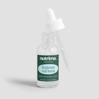 Clear glass bottle with a dropper and label for Hyaluronic Acid Serum by nutrima, showcasing the product’s purity and simplic