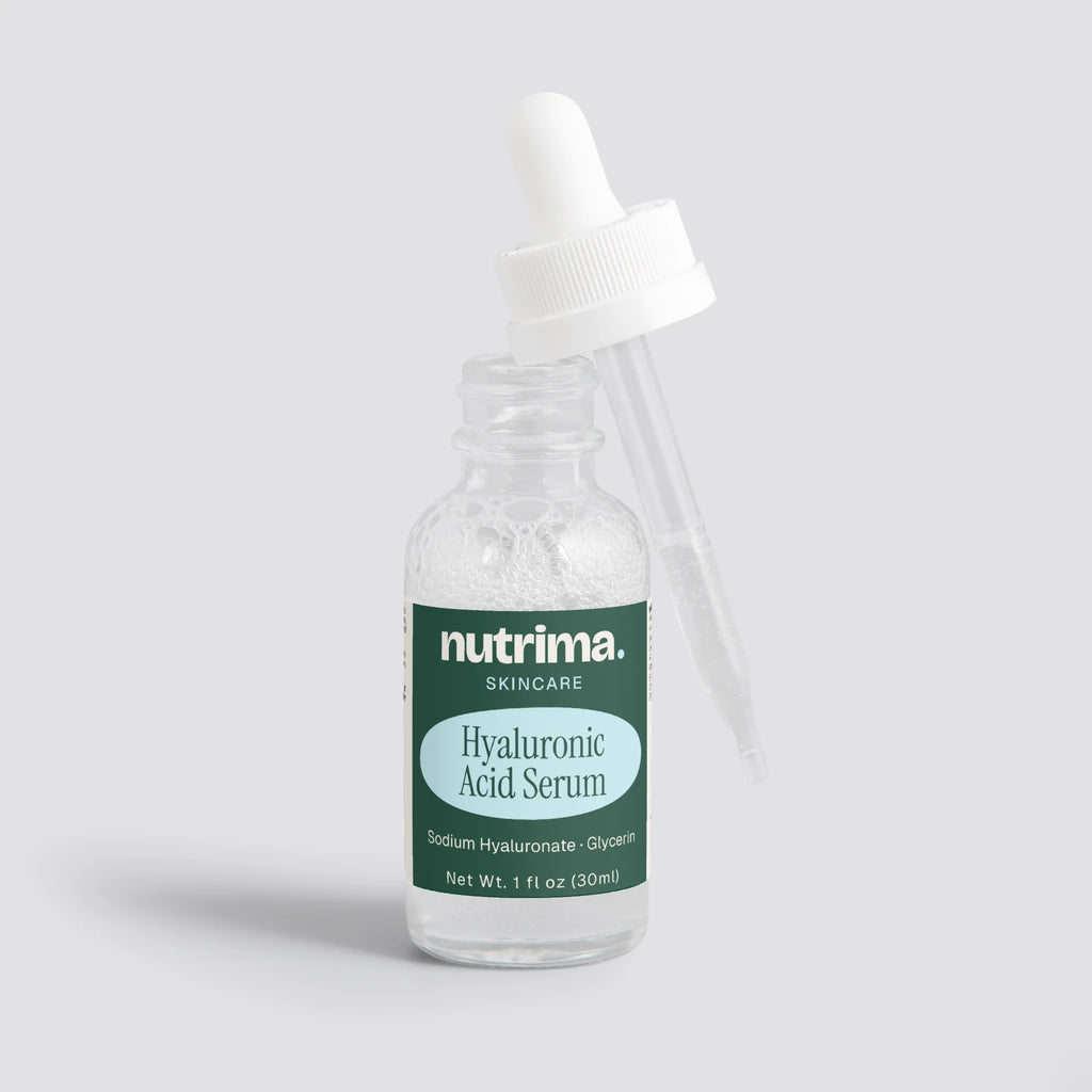 Clear bottle with dropper showcasing Hyaluronic Acid Serum, featuring a green label by nutrima.