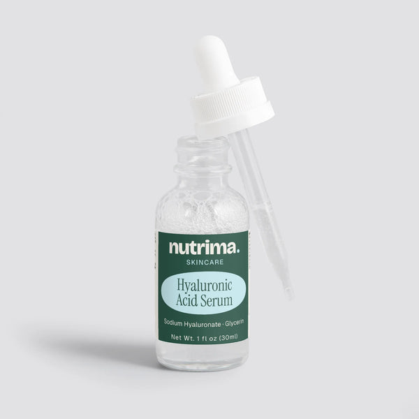 Clear bottle with dropper showcasing Hyaluronic Acid Serum, featuring a green label by nutrima.