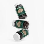Three bottles of Mushroom Extract Complex by nutrima displayed at an angle, highlighting the green packaging and gummy form.