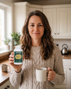 nutrima Magnesium Glycinate bottle held by a woman in a morning kitchen — AI-generated brand image