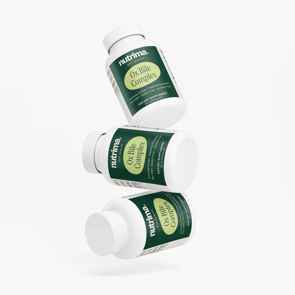 Three bottles of Ox Bile Complex floating against a white background, showcasing the green labels by nutrima.