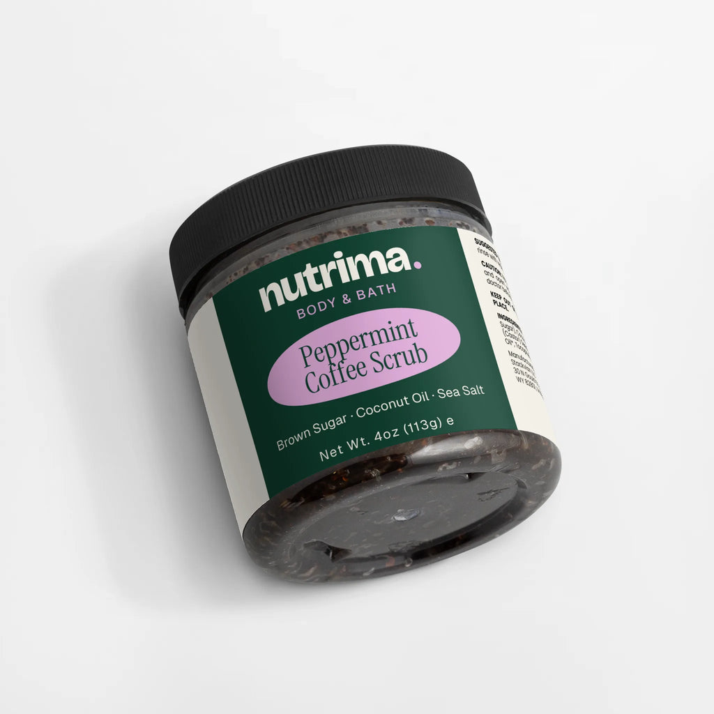 View of the Peppermint Coffee Scrub jar featuring a black lid and colorful label design by nutrima.