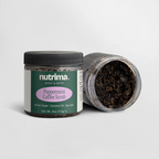 Close-up of Peppermint Coffee Scrub jar with black scrub visible, showcasing packaging design by nutrima.