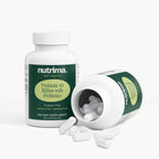 White capsules spill from an open bottle next to a closed one, featuring "Probiotic 40 Billion with Prebiotics" by nutrima.
