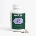 Bottle of Sea Moss dietary supplement by nutrima with capsules beside it, featuring a green and purple design.