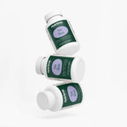 Three bottles of Sea Moss dietary supplement by nutrima, featuring a vibrant green and purple design on white containers.