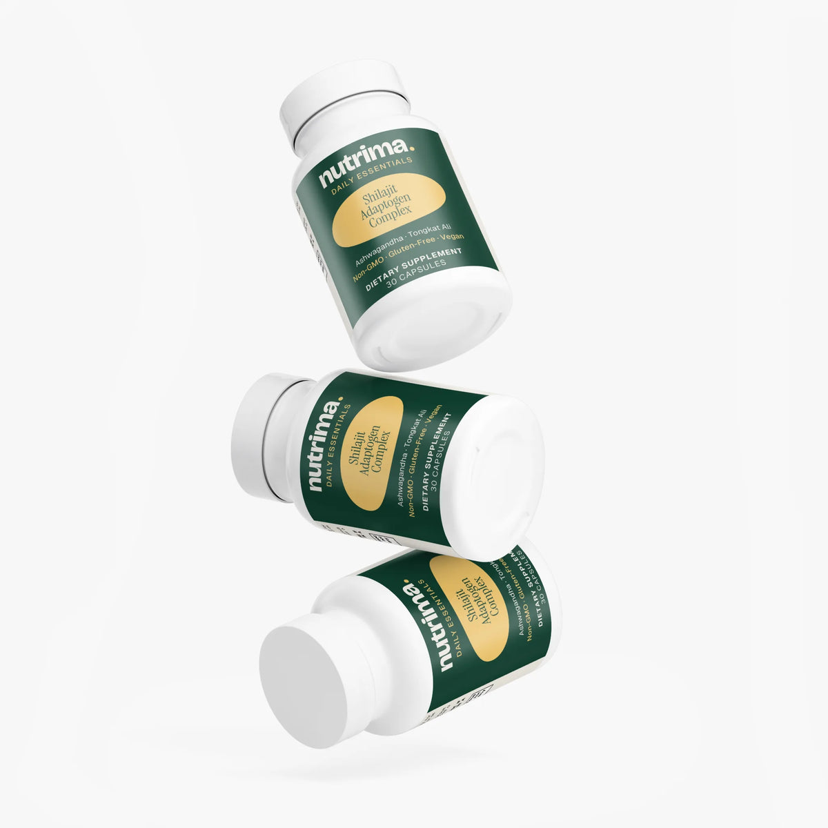 Three bottles of Shilajit Adaptogen Complex are displayed, featuring green labels and showcasing the product by nutrima.