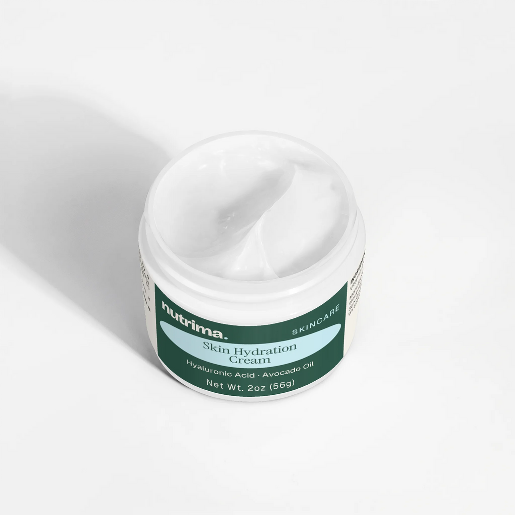 Close-up of the creamy texture in the open jar of Skin Hydration Cream by nutrima.