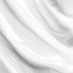Close-up of smooth, glossy white texture of Skin Hydration Cream, featuring a silky finish by nutrima.