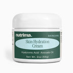Close-up of Skin Hydration Cream jar featuring a green label and white lid, showcasing facial care by nutrima.