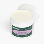 Opened jar of Tallow Cream Orange & Bergamot showcasing its creamy texture, by nutrima.
