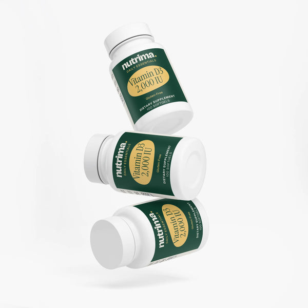 Three floating bottles of Vitamin D3 2,000 IU softgels showcasing vibrant green and yellow packaging by nutrima.