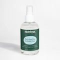 Clear spray bottle of Witch Hazel Pore Perfecting Toner featuring a dark green label and white cap by nutrima.