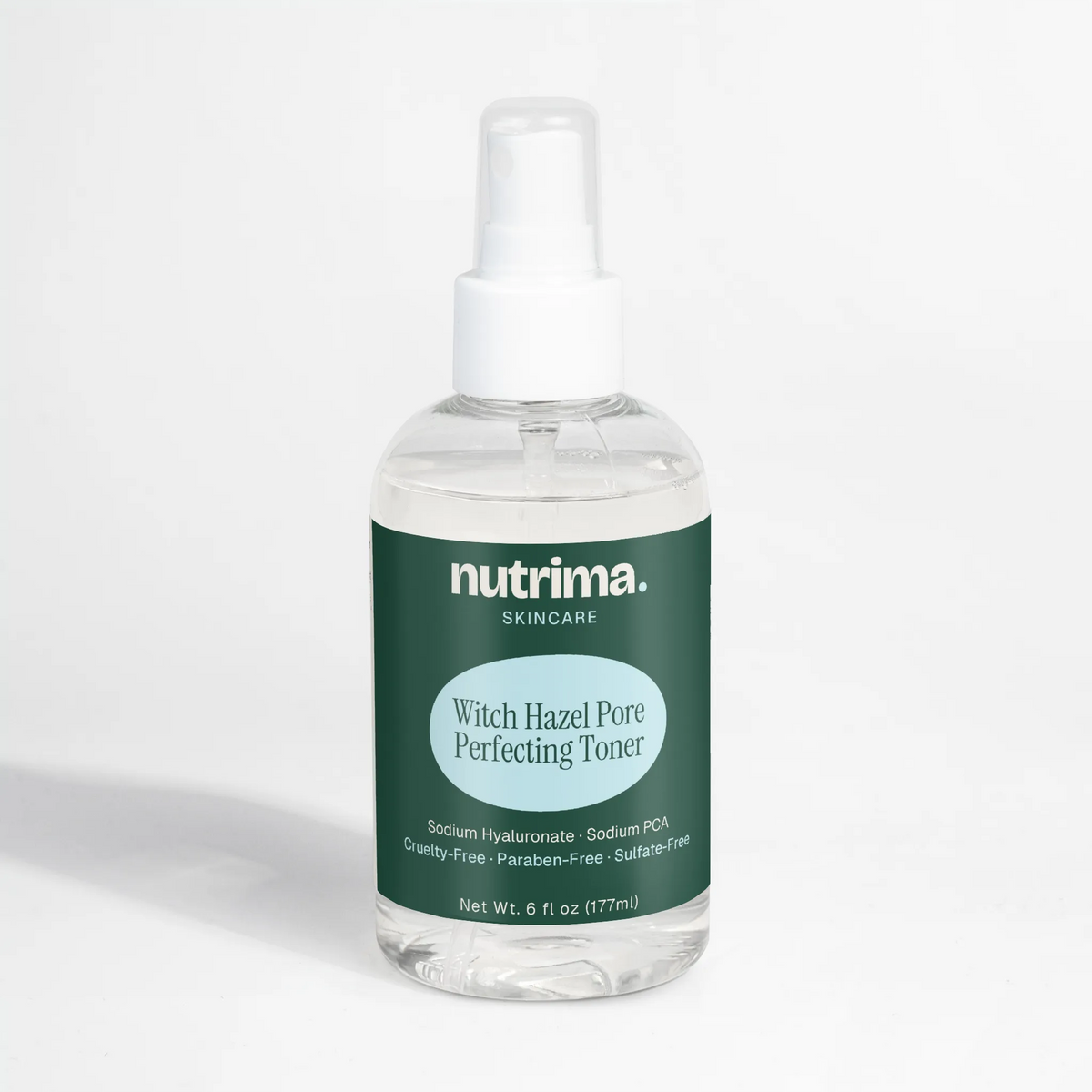 Clear spray bottle of Witch Hazel Pore Perfecting Toner featuring a dark green label and white cap by nutrima.